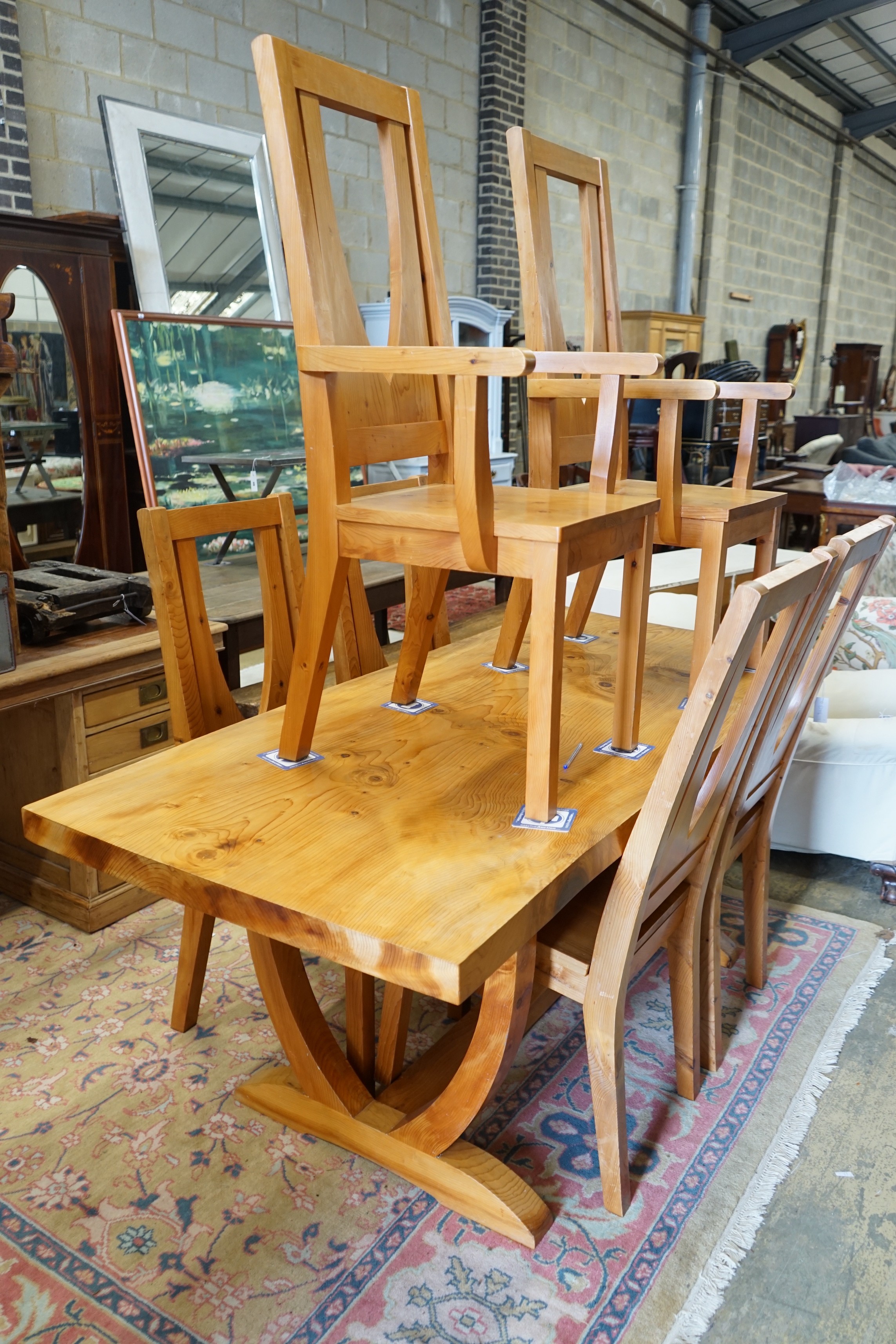 An Ian Anderson cedar rectangular single planked top dining table, length 190cm, width 83cm, height 78cm and six chairs, two with arms